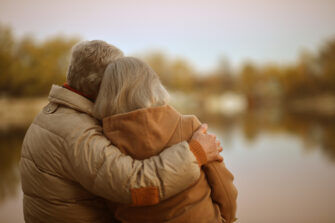 Senior couple hugging